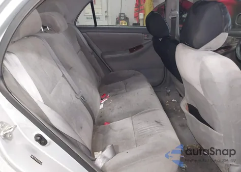 2005 Toyota Corolla Le z USA, uszkodzony, nr VIN 2T1BR32E95C552392